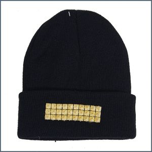 Black beanie with golden colored rivets ― Contieurope